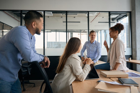 Team of employees participating in brainstorming sessionの写真素材