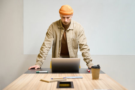 Focused company employee preparing for online presentationの写真素材