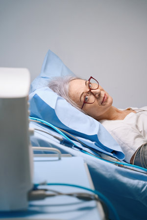 Elderly woman is being examined in the cardiology departmentの写真素材