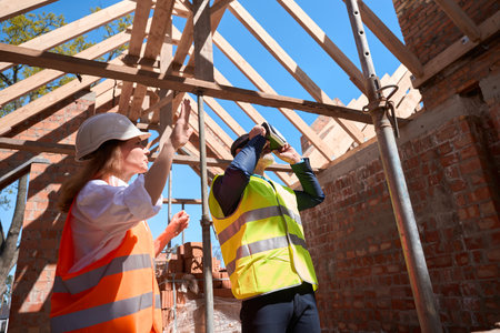 Foreman using virtual reality headset for vision of constructed building resultの写真素材