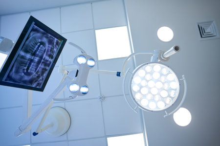 Surgical lamp and monitor with the image of dental x-rayの写真素材