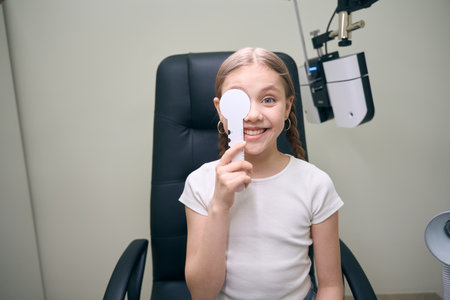 Young patient in the clinic on an ophthalmological diagnostic test