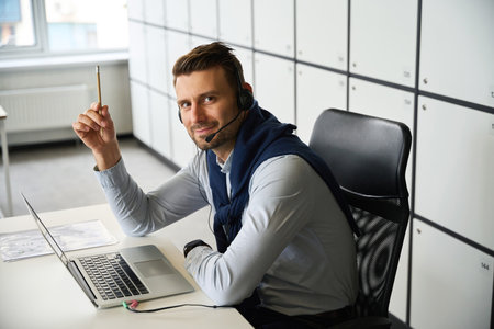 Employee is located in the office area of coworking space