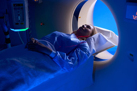 Female patient undergoing contrast-enhanced chest computed tomography