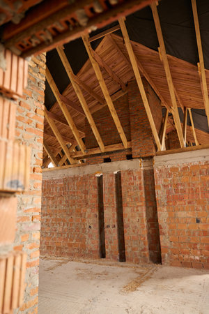 Empty loft of residential building under constructionの写真素材