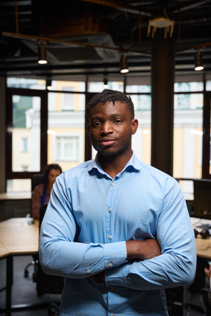 African American man folding hands on chest looking cameraの写真素材
