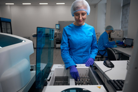 Laboratory assistant works with blood samples in the laboratory