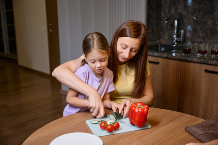 Mother spends time with her little daughterの写真素材