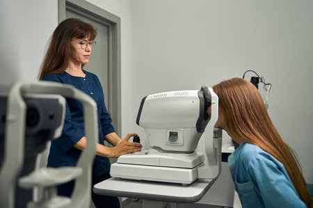 Female patient undergoing non-invasive eye exam procedure