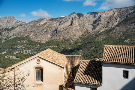Roofs of houses in small town in Valencia, in a mountainous part, in the province of Alicante, Spainの写真素材