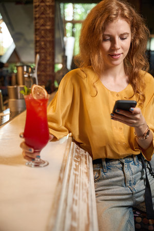 Young woman with a drink