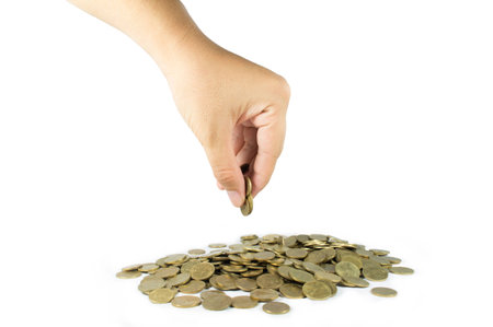 Hand pick up money on white isolatedの写真素材