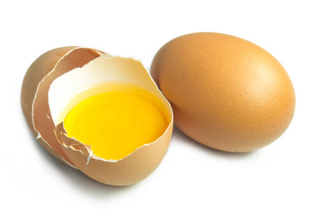 Broken egg on white isolated