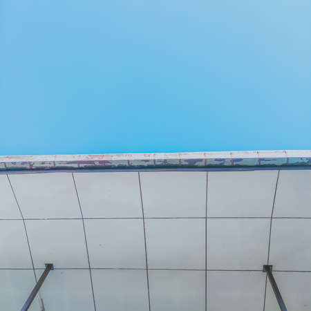 Perspective view of building and blue sky, minimal geometric