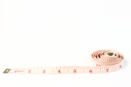 Measuring tape isolated on white background with area for textの写真素材