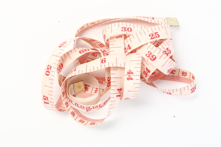 Measuring tape isolated on white background with area for textの写真素材