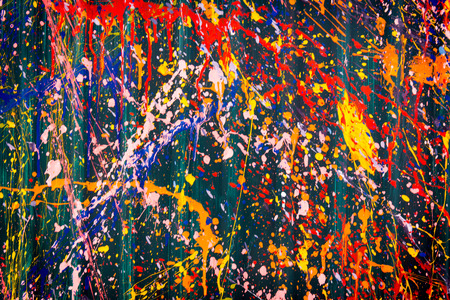 Abstract, Colorful Paint Splash on a green background.の写真素材