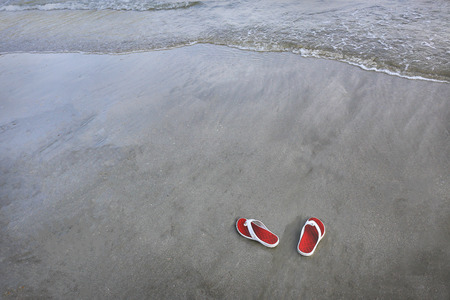 Sandals on a beachの写真素材