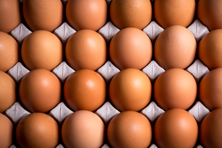 Soft focus Fresh organic panel eggs on sackcloth