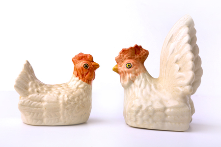 Ceramic Chicken souvenir  on white backgroundの写真素材