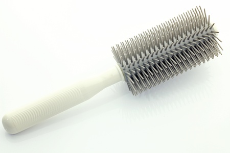 hairbrush isolated on a white backgroundの写真素材