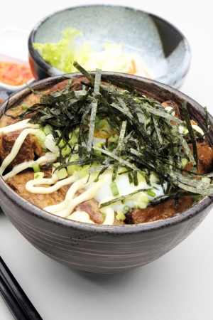 Japanese steamed rice with pork.の写真素材