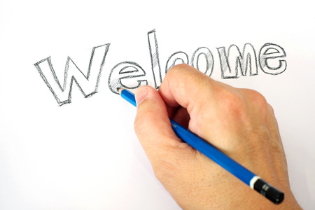 Drawing, writing "Welcome".の写真素材