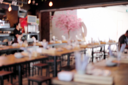 Abstract blur people in restaurant or food center with light bokeh background.の写真素材