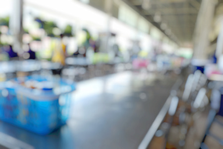 Abstract blur people in food center with light bokeh background.の写真素材