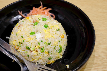 Japanese fried rice on wooden tableの写真素材