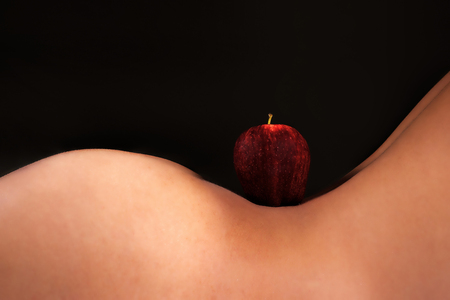 Apple proportion of nude women.の写真素材