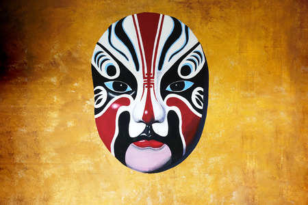 Chinese mask on the wall                               の写真素材