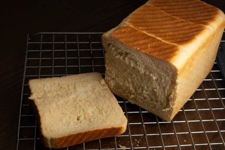 bread on a sieve on a wooden table