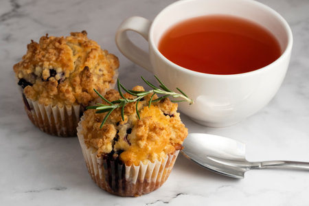 Blueberry Crumble Muffins on the marble floorの写真素材