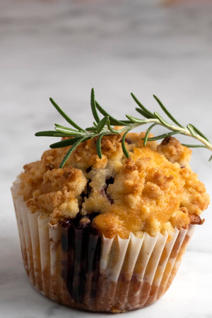 Blueberry Crumble Muffins on the marble floorの写真素材