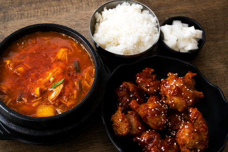 Korean Set Meal Kimchi Soup with Fried Chicken in Korean Sauceの写真素材