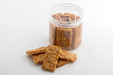 Almond bar cookies slabs on marble table topの写真素材