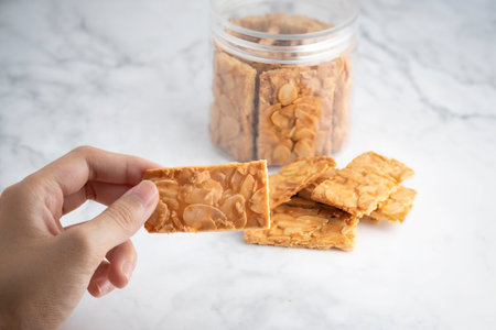 Almond bar cookies slabs on marble table topの写真素材