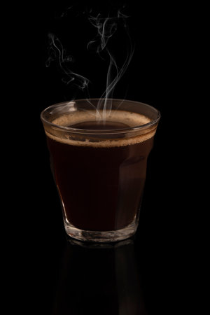 Hot espresso coffee on black backgroundの写真素材