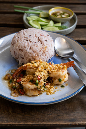 Stir Fried Shrimp with Garlic and Chili on Riceの写真素材