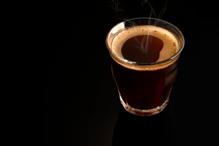Hot espresso coffee on black backgroundの写真素材