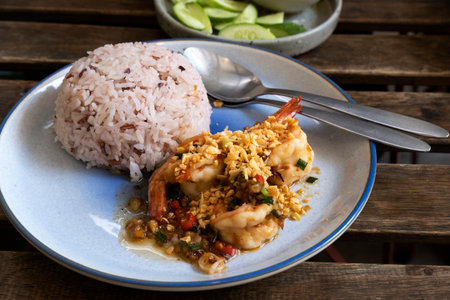 Stir Fried Shrimp with Garlic and Chili on Riceの写真素材