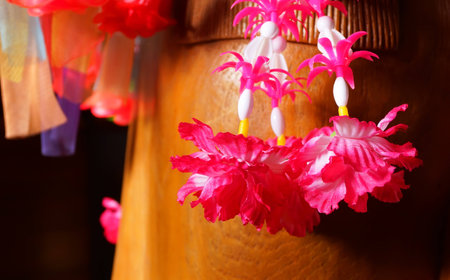 Colorful Thai plastic garland, can be found at any Buddhist Templeの写真素材