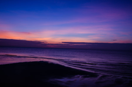 morning sky with dramatic clouds over the seaの写真素材