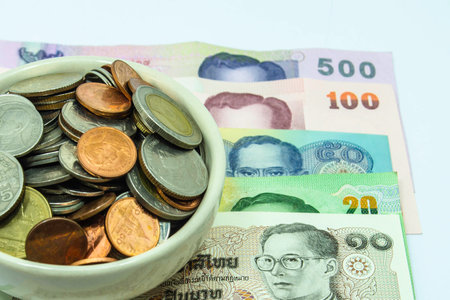 Thailand coins and banknotes one hundred baht の写真素材