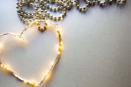 NY letters made of LED on a silver background and Christmas beadsの写真素材