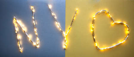 NY letters made of LED on a silver background and Christmas beadsの写真素材