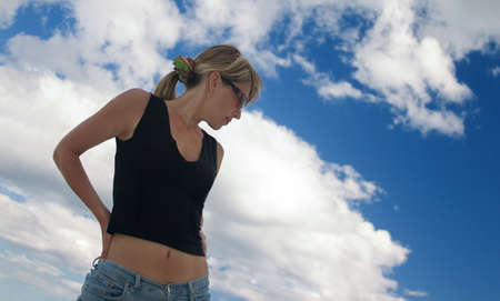 Girl sensitively looks downwards