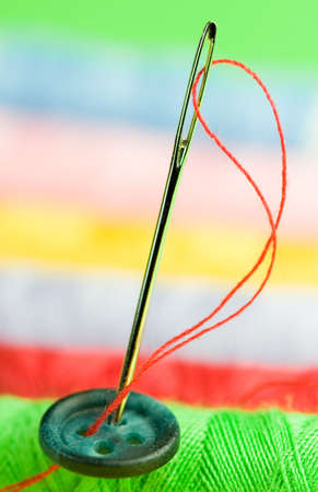 Close-up of a needle on a colourful backgroundの写真素材