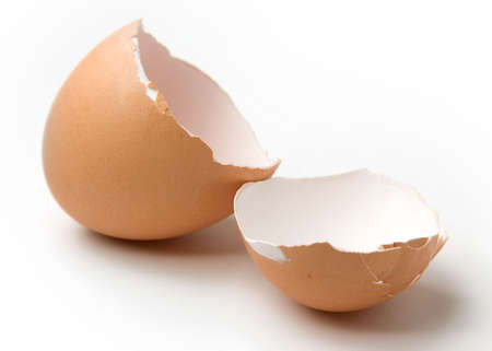 Broken egg shell on white background